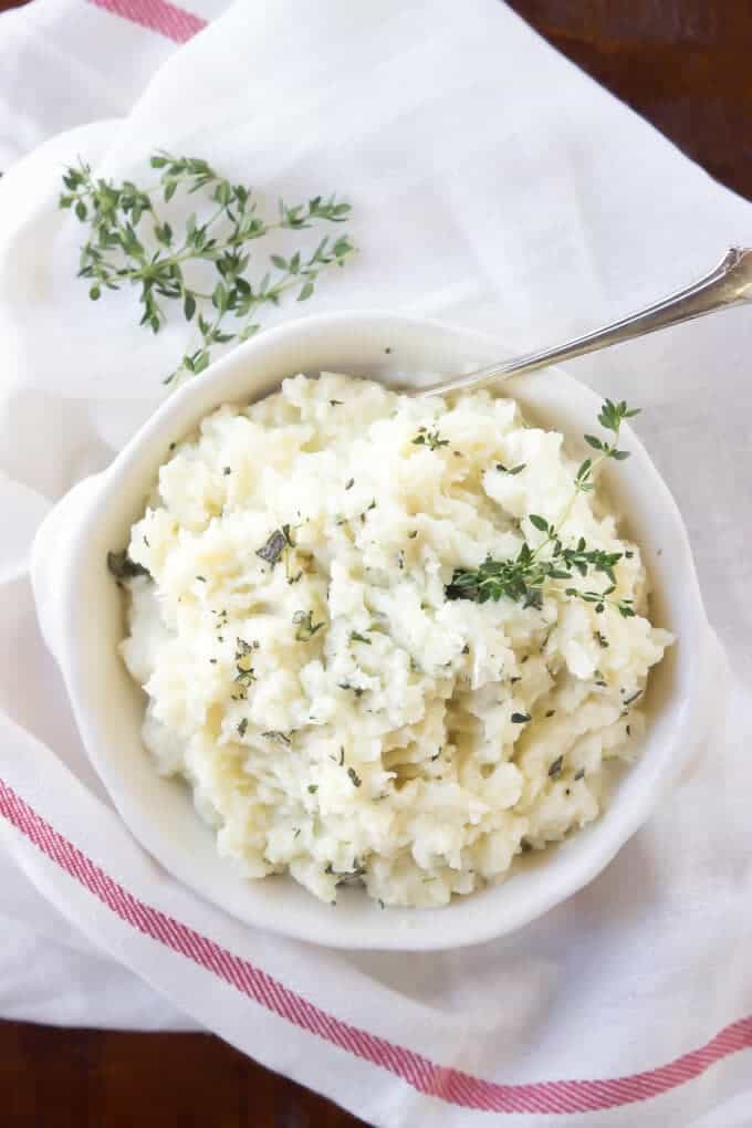 slow cooker garlic herb mashed cauliflower